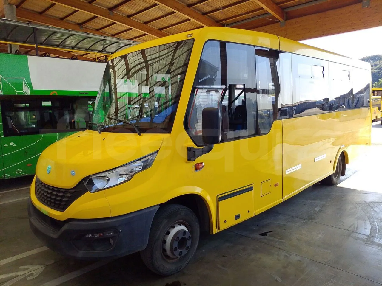 Iveco Indcar WGIVMY11 MOBI SCUOLABUS - EUR6 - 100Kw - 8,592m - 3/4 front left (mandatory for bus to scrap)