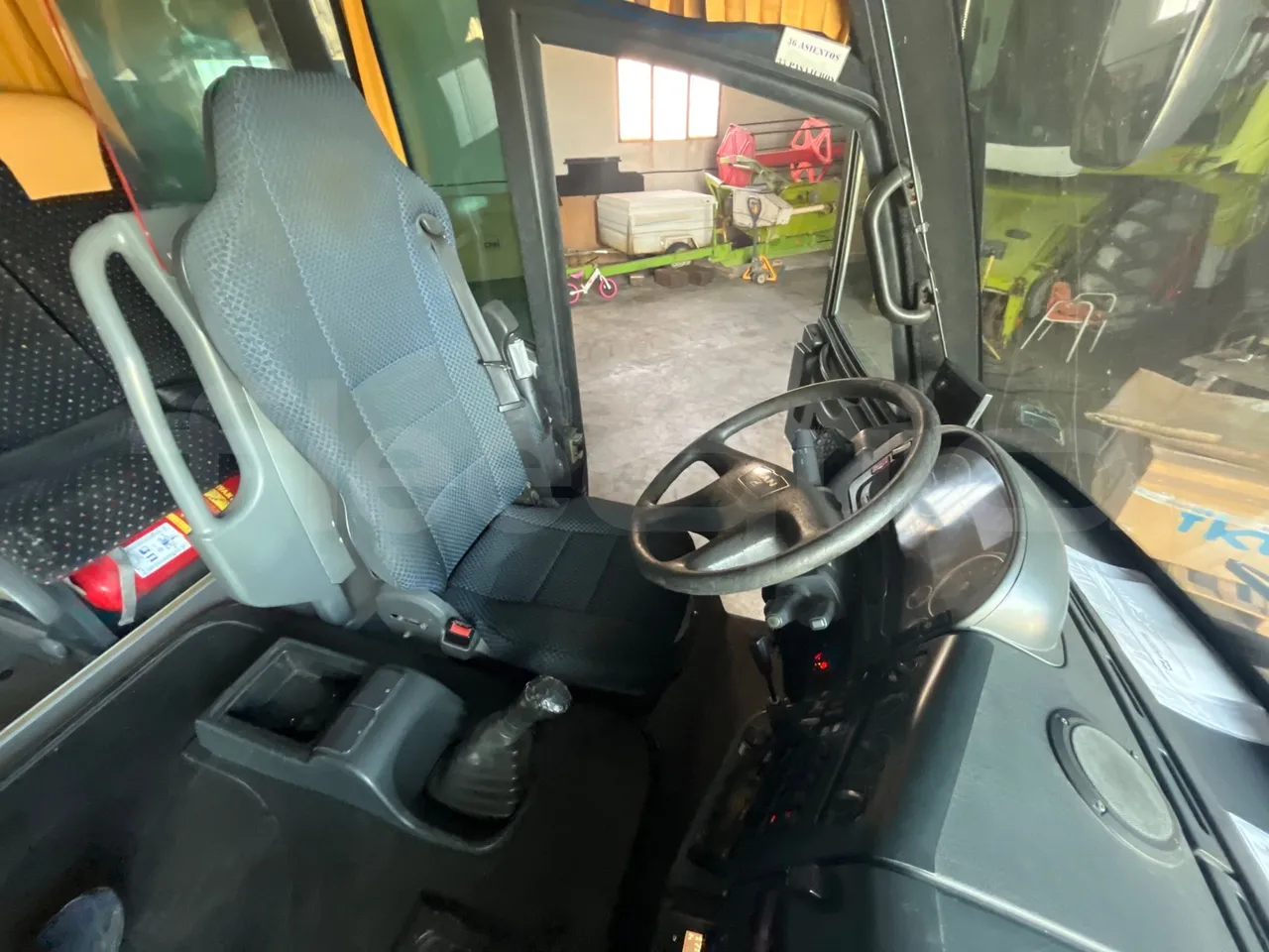 Man 12.220 HOCL 12.240/DEXON -  EUR4 - 176kW - 9.460m - driver's seat photo