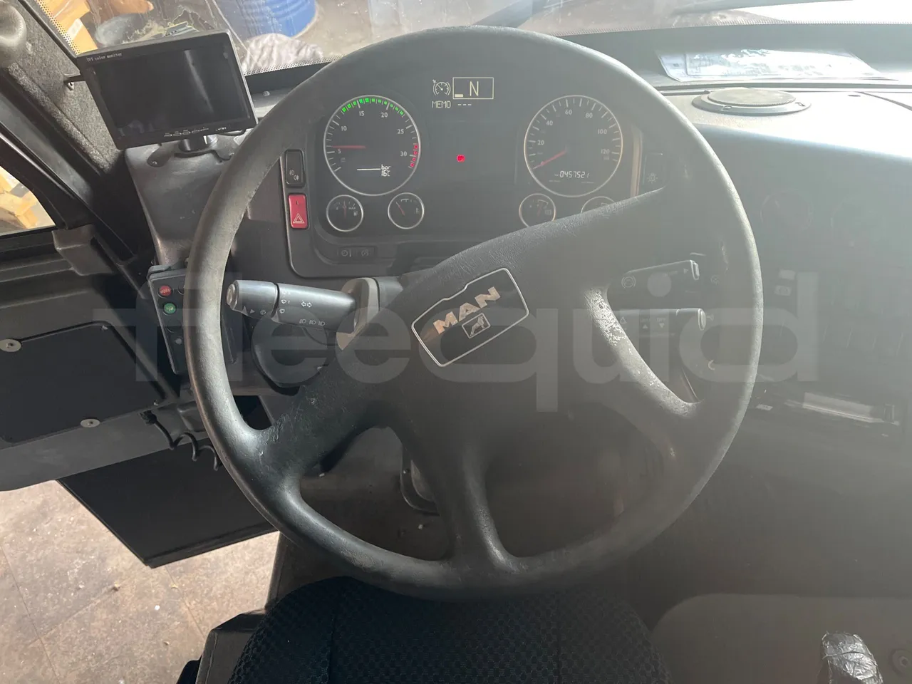 Man 12.220 HOCL 12.240/DEXON -  EUR4 - 176kW - 9.460m - steering wheel photo