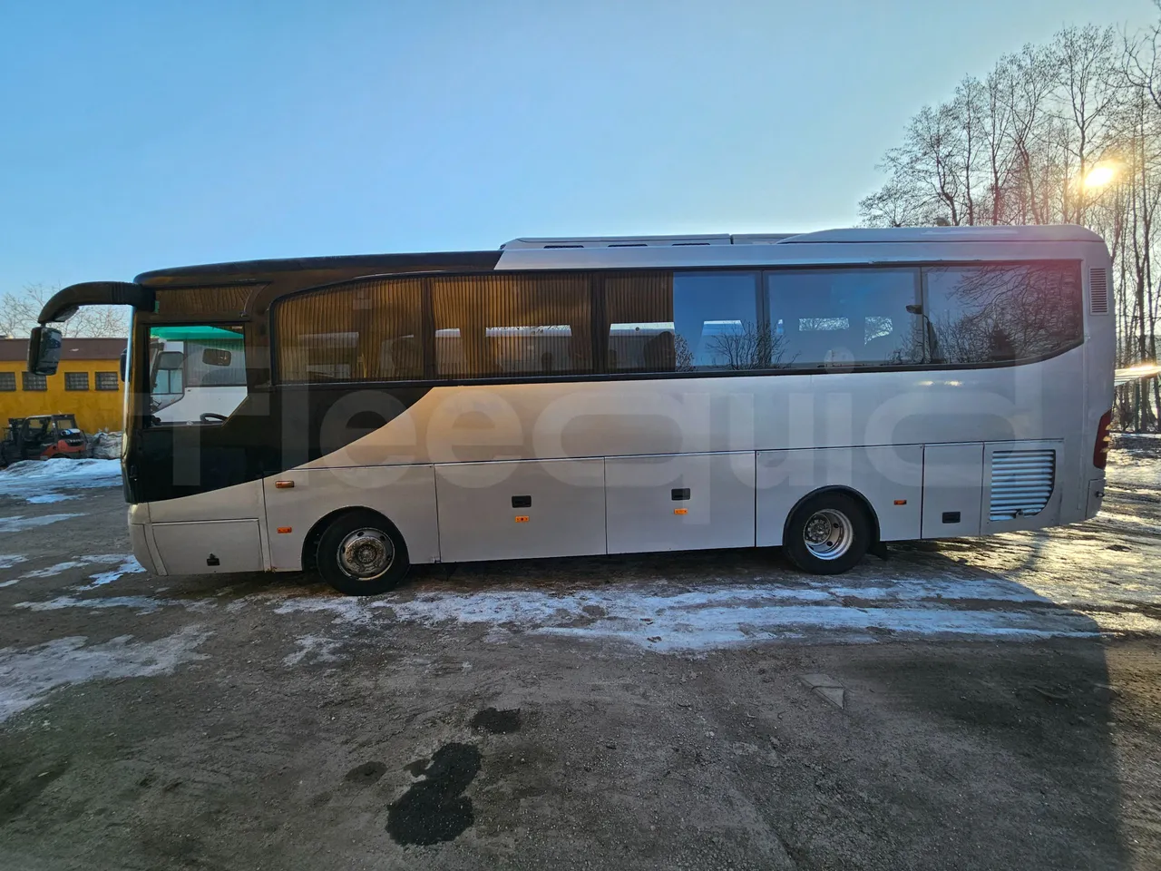 Man TEZELLER Teztiger T35 - Euro 4 - 132 kW -9.02 mt - left side photo