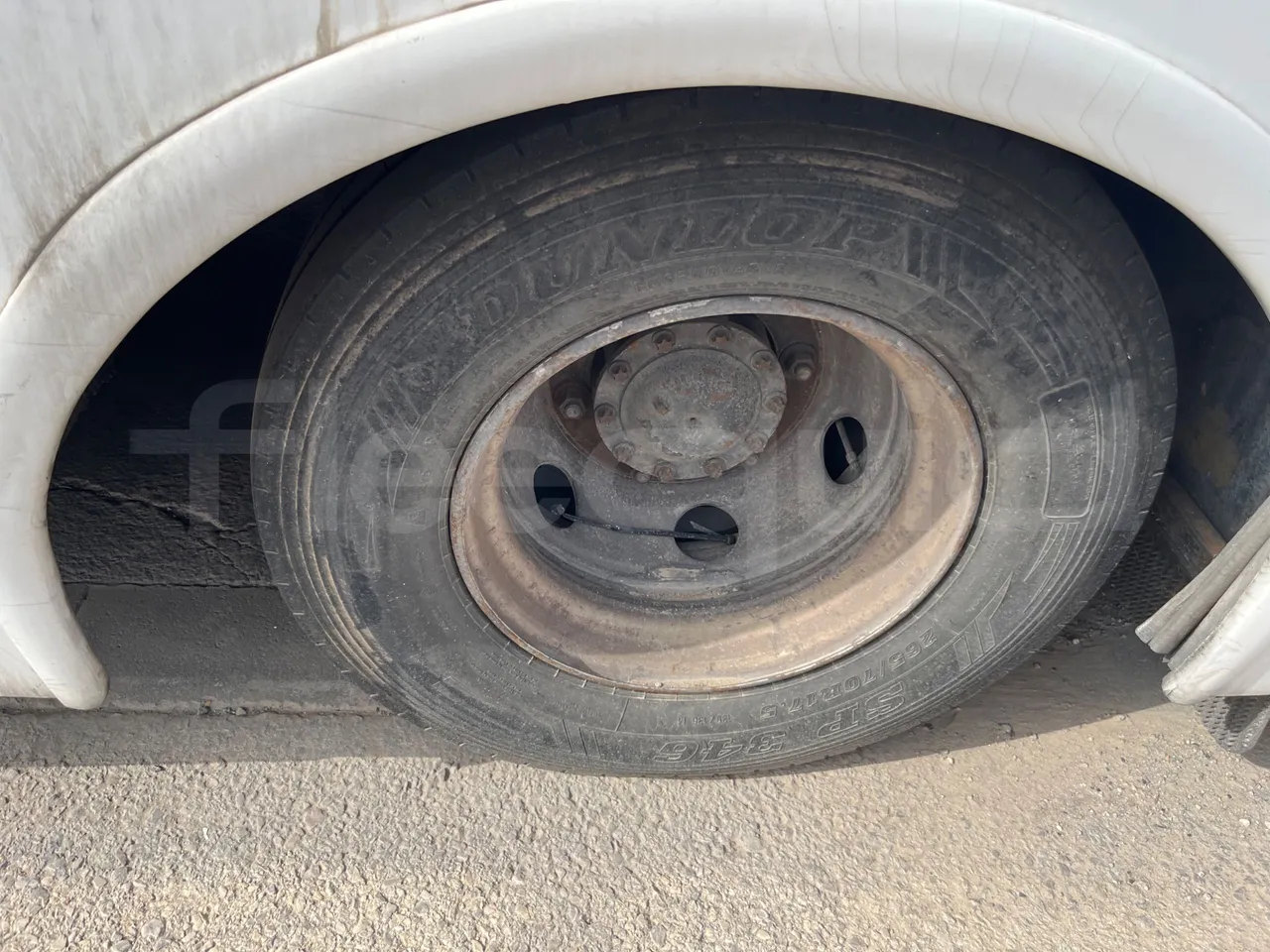 Man 12.220 HOCL ANDECAR VII.1/ Euro 4 - 176 Kw - 9,470 Mt - rear left tire photo