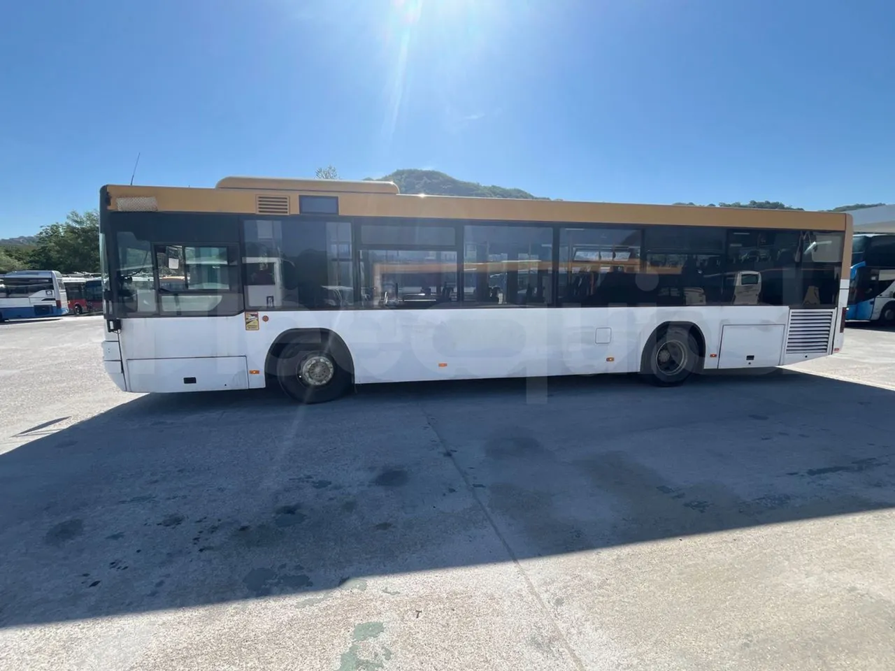 Man Lion's City T A78 - EUR4 - 191kW - 11.857m - left side photo