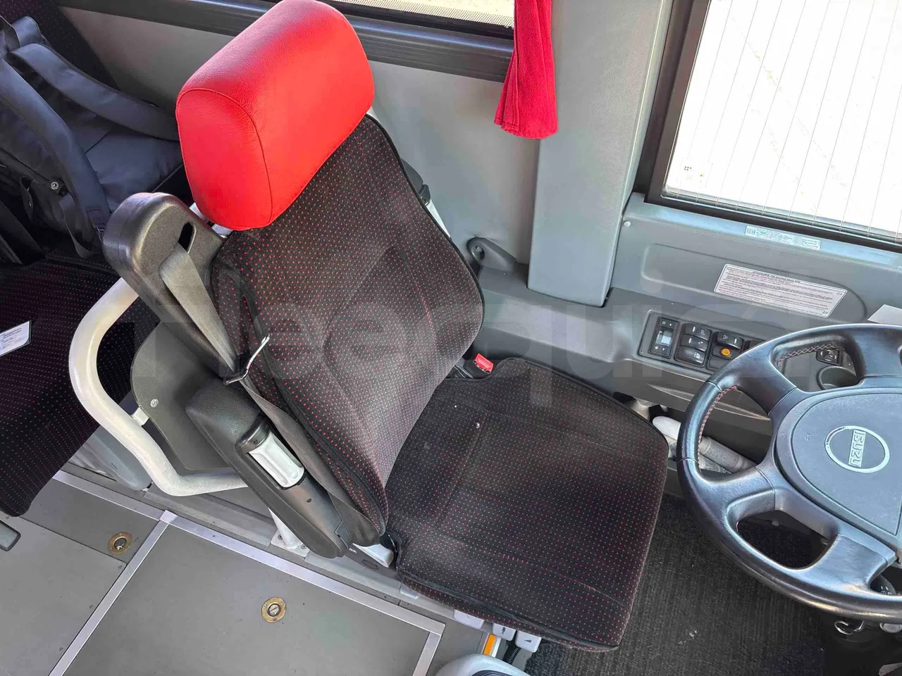 Isuzu Novo - driver's seat photo