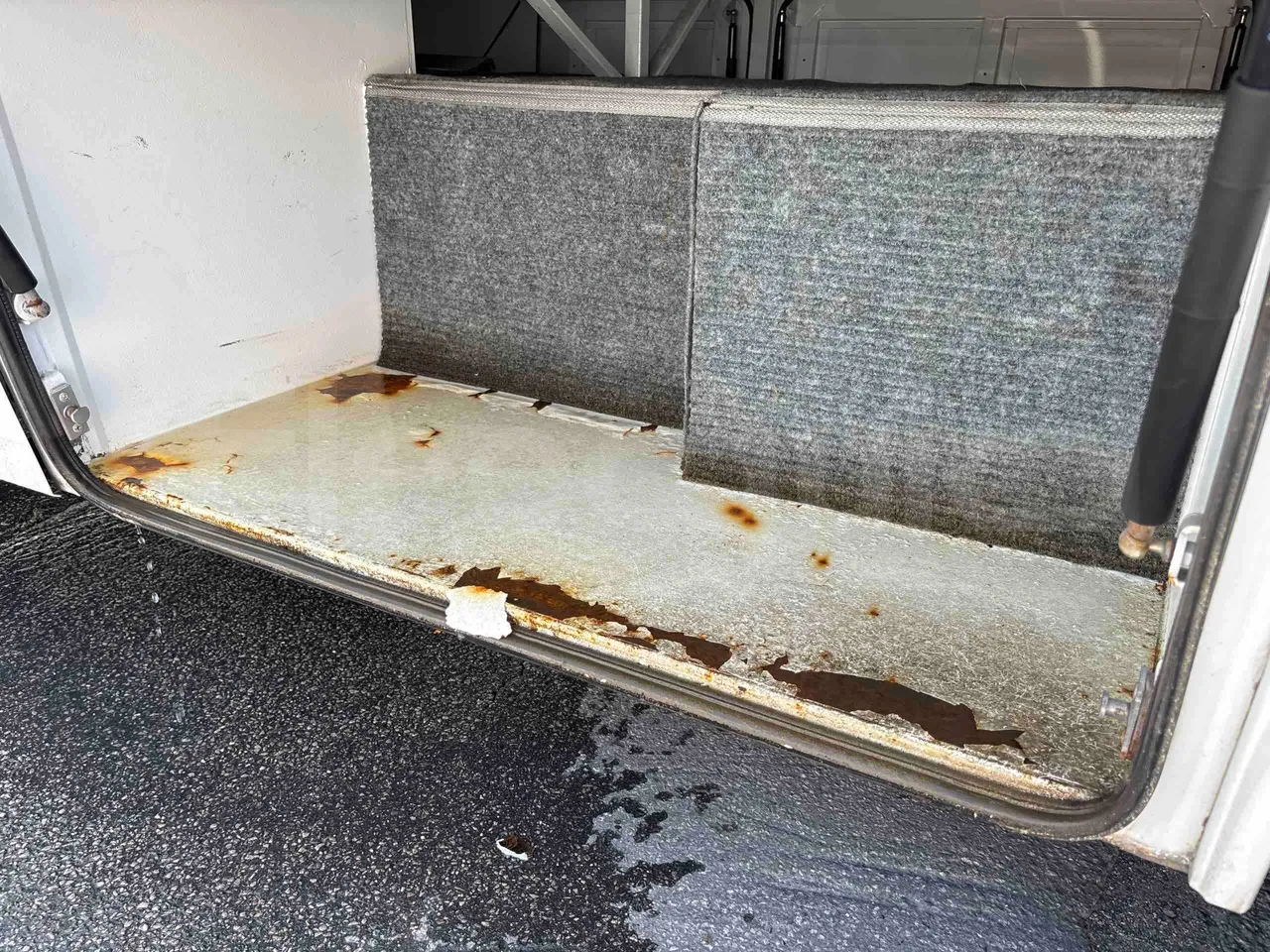 Isuzu Novo - under carpet photo