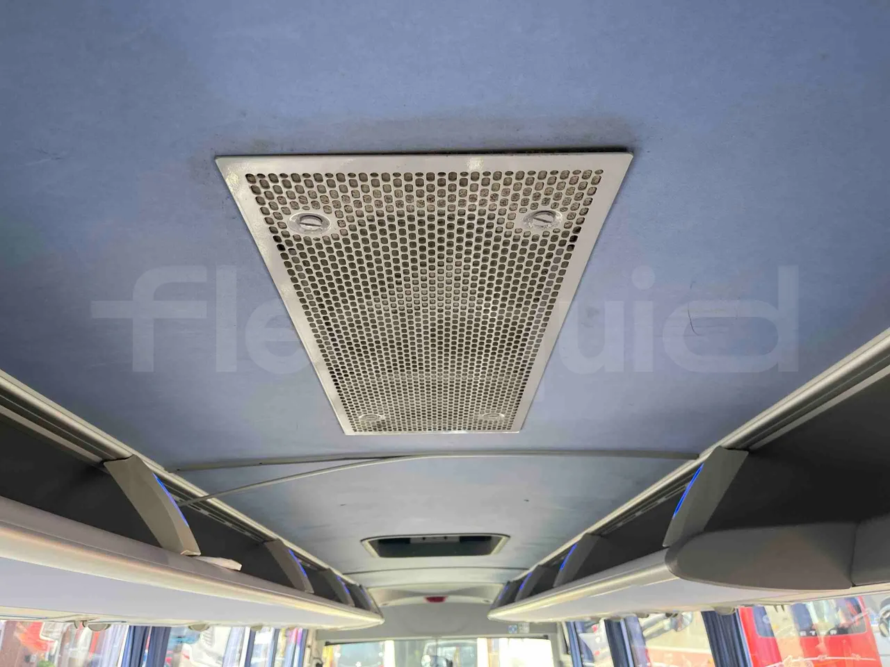 Isuzu Turquoise - overhead compartments photo