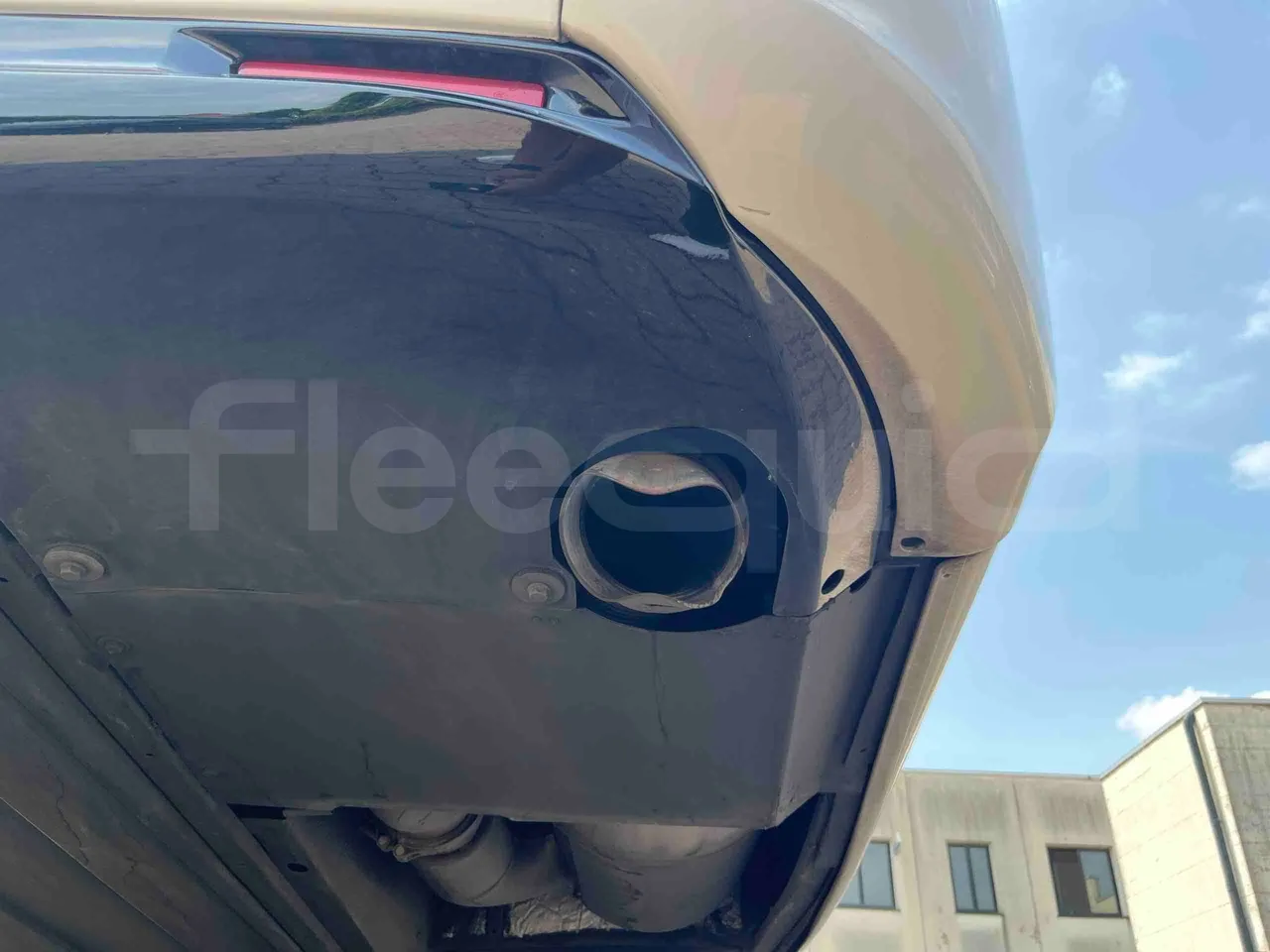 Man Lion's Coach - exhaust photo