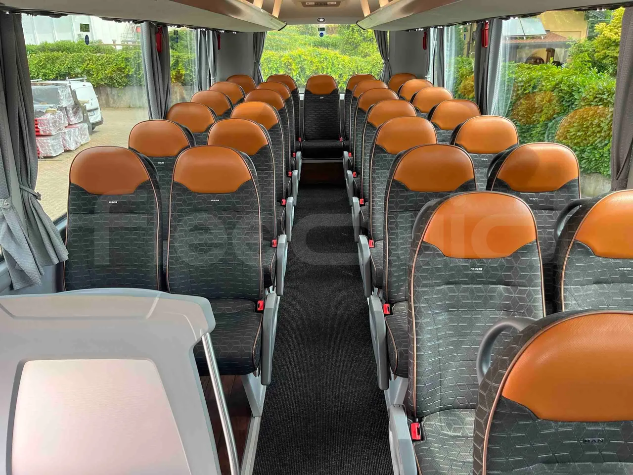 Man Lion's Coach - reverse view middle aisle