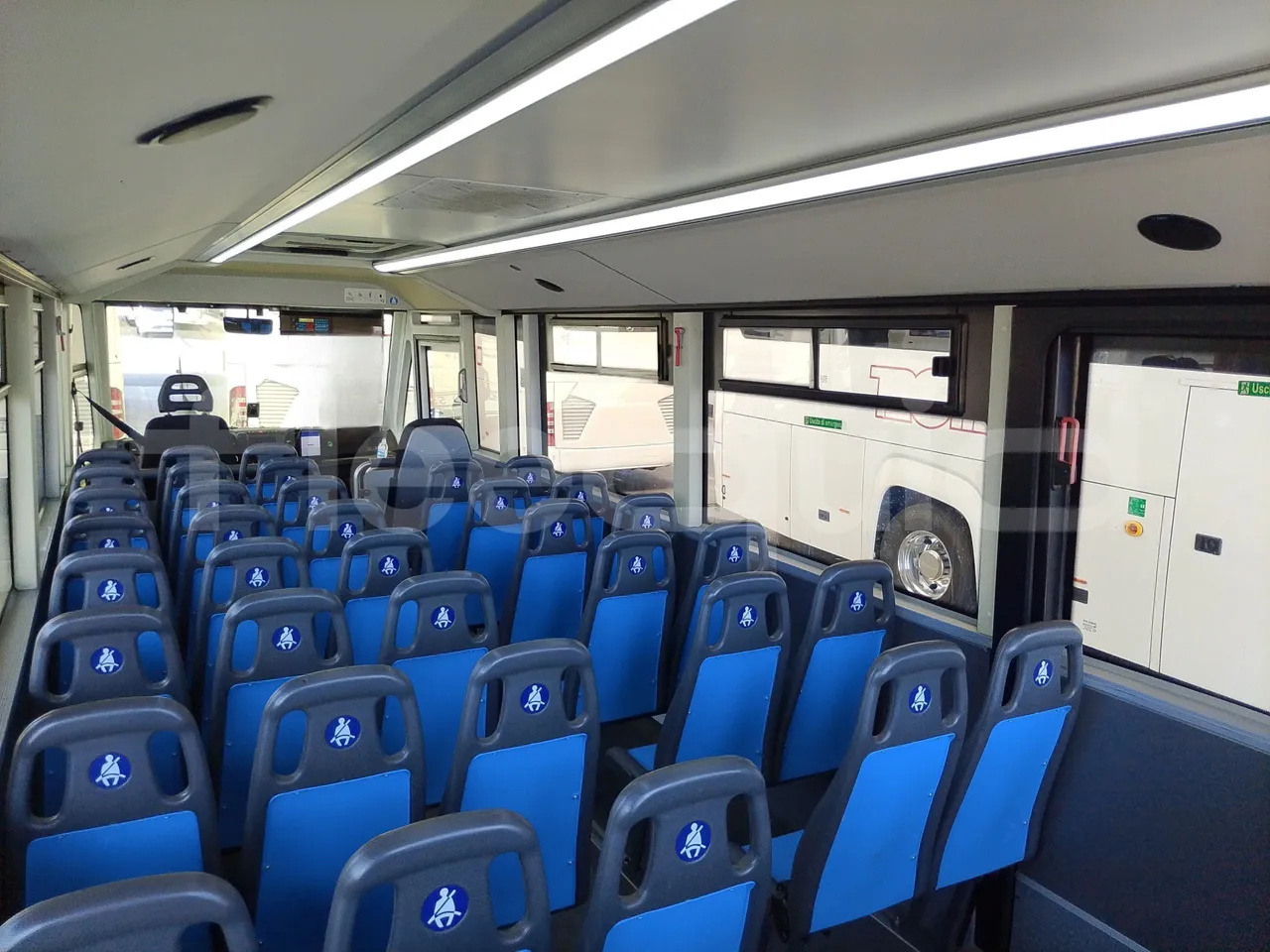 Iveco Indcar WGIVMY11 MOBI SCUOLABUS - EUR6 - 100Kw - 8,592m - forward view all seats last row height