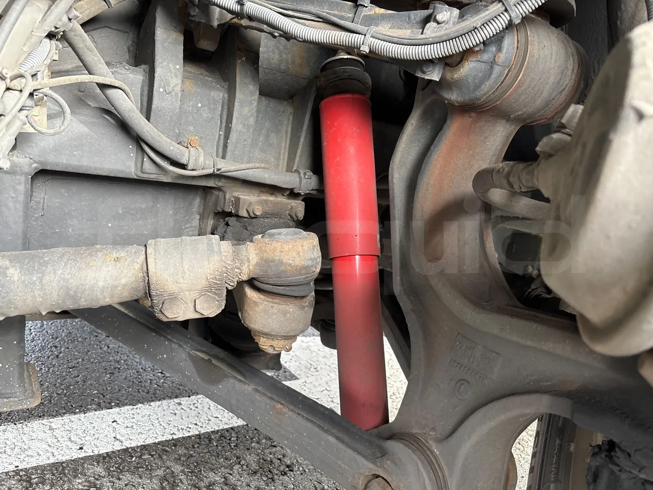 Van Hool Astromega TDX27 - EUR6 - 375kW - 14.105m - front shock absorbers left