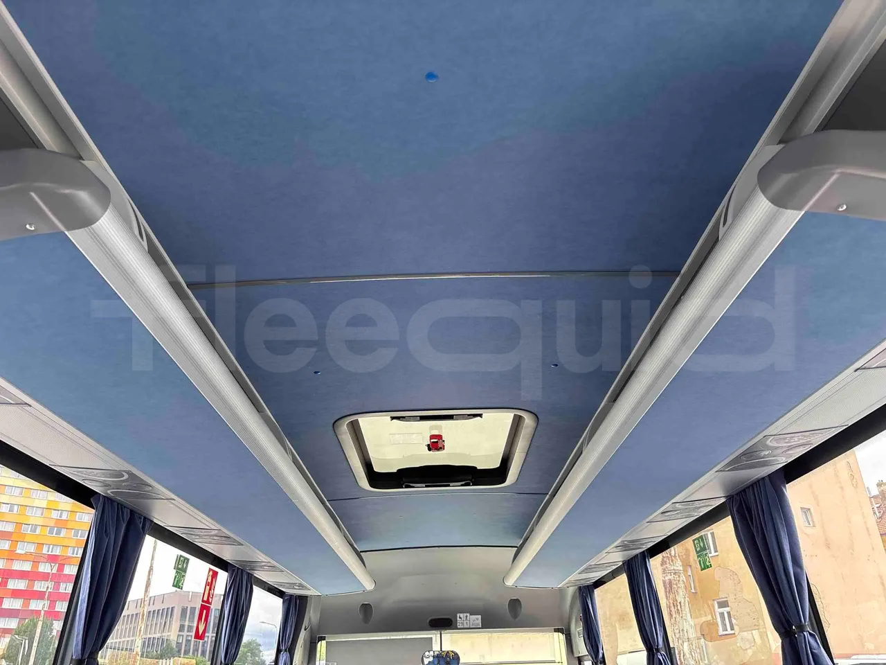 Isuzu Novo - overhead compartments photo