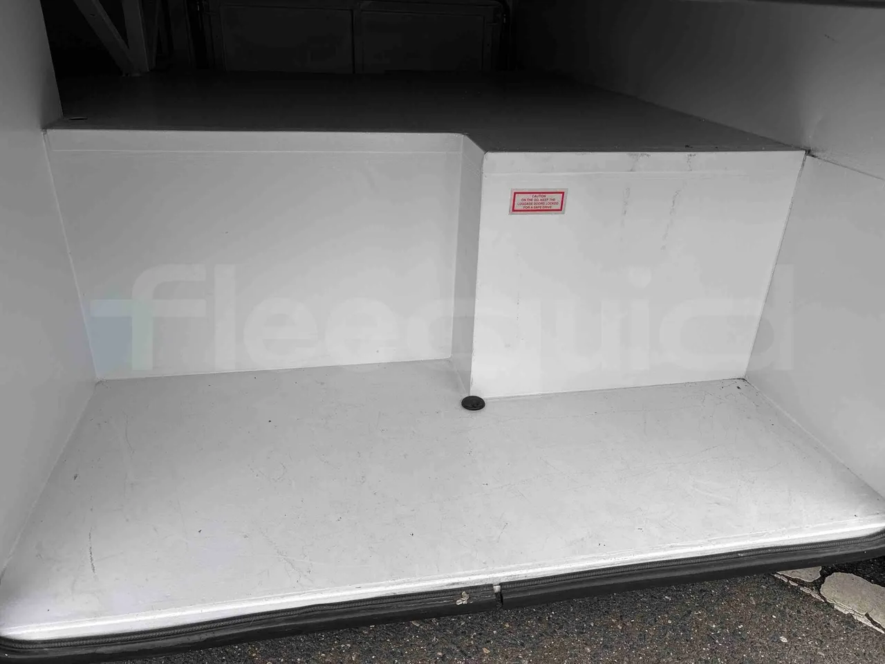 Isuzu Novo - under carpet photo