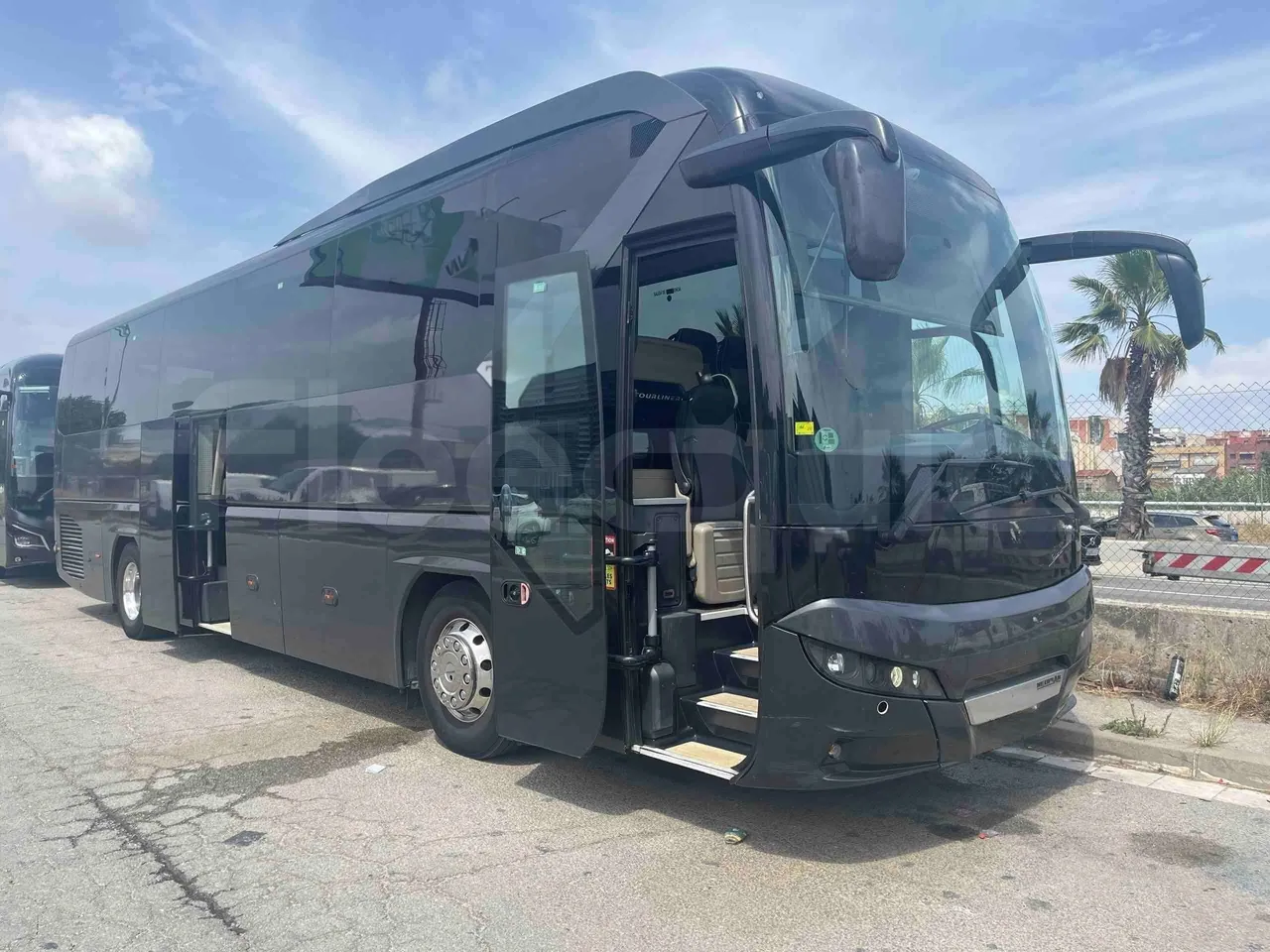 Neoplan Tourliner - 3/4 Front Right Side Doors Open