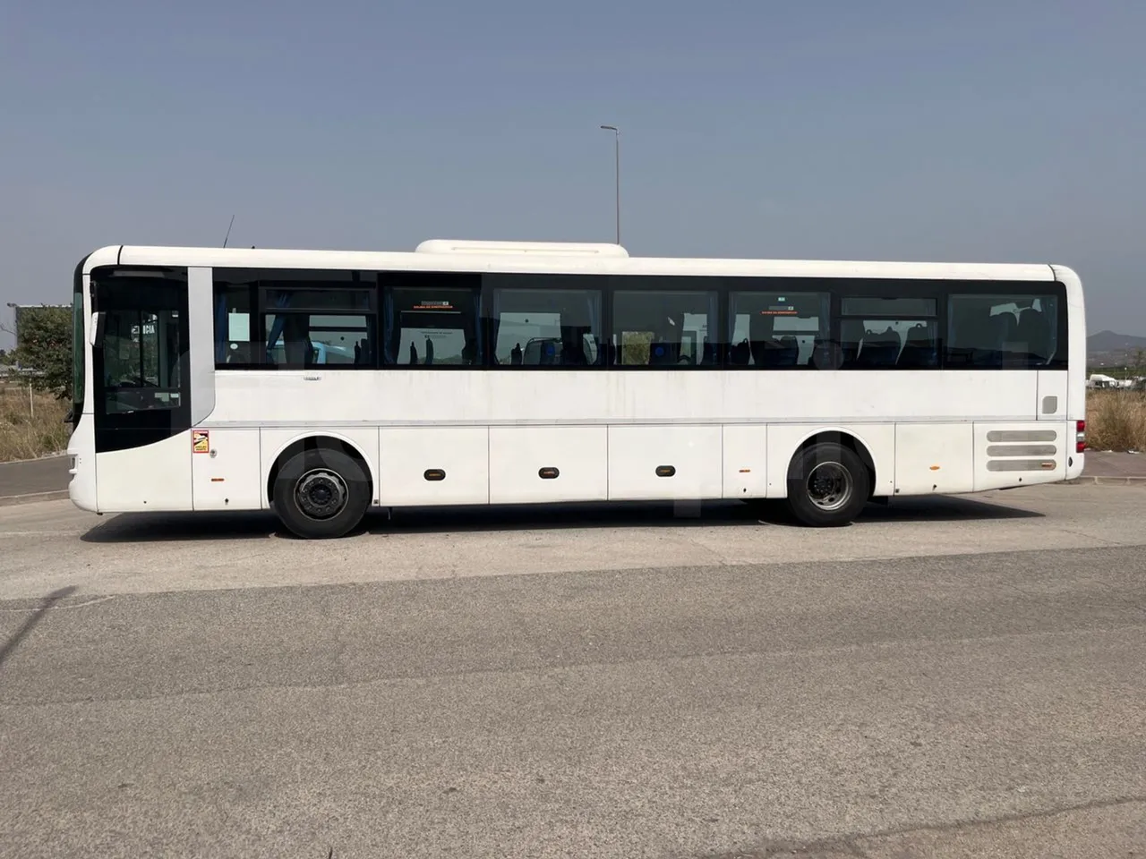 Man Lion's Intercity B.2007.46.008/ Euro 6 - 213 Kw - 12.280 Mt - left side photo