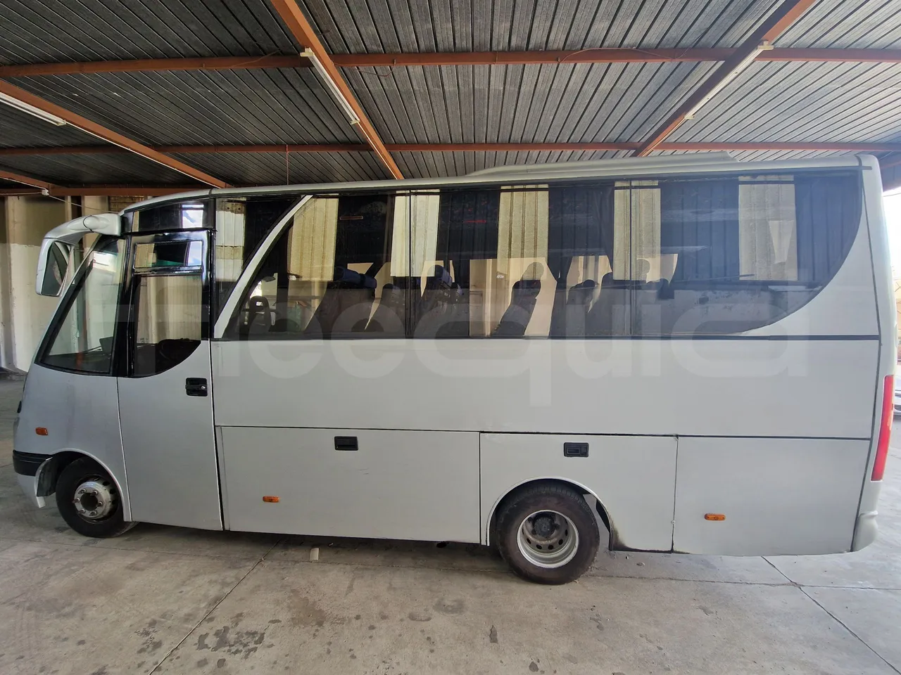 Iveco 65C15/70 JB - left side photo