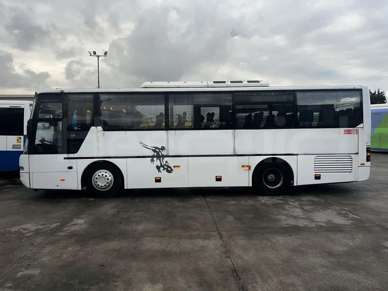 Neoplan N312 K - EUR3 - 260kW - 9.950m - left side photo