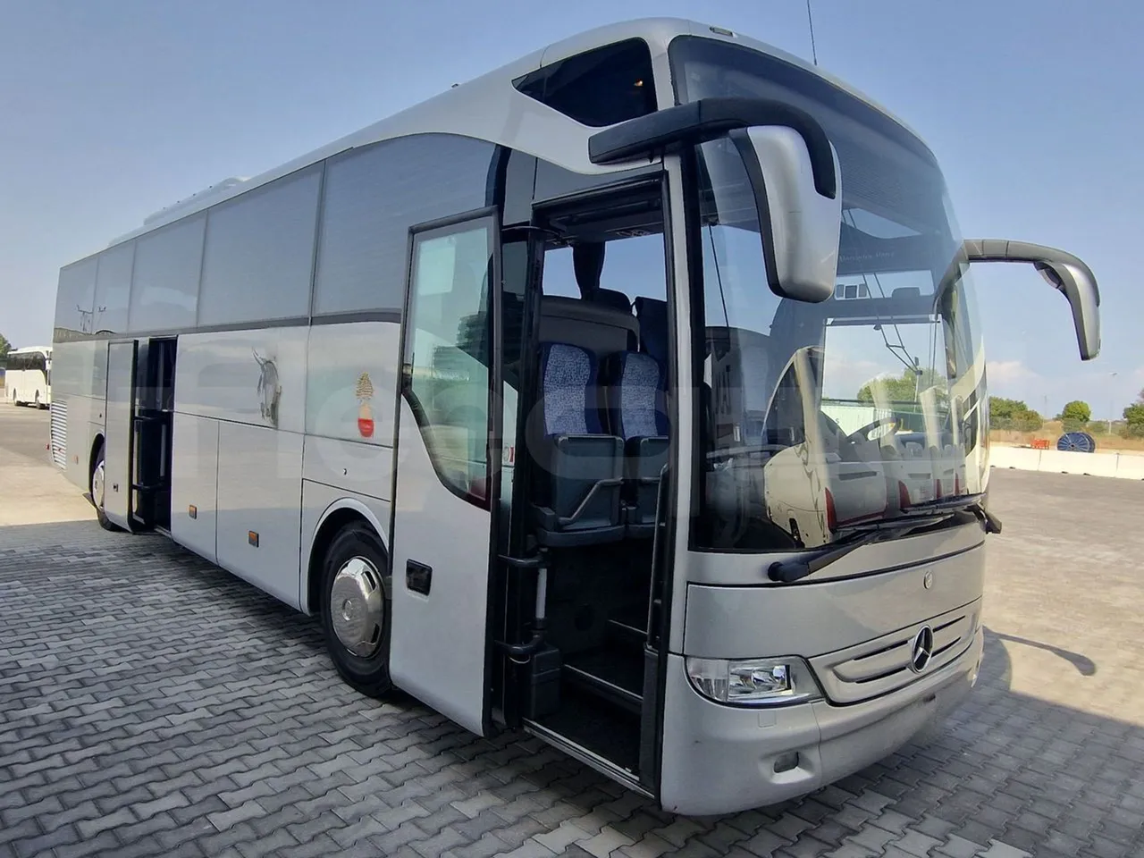 Mercedes-Benz Tourismo RHD/ Euro 5 - 300 Kw - 12,140 Mt - 3/4 right front doors open