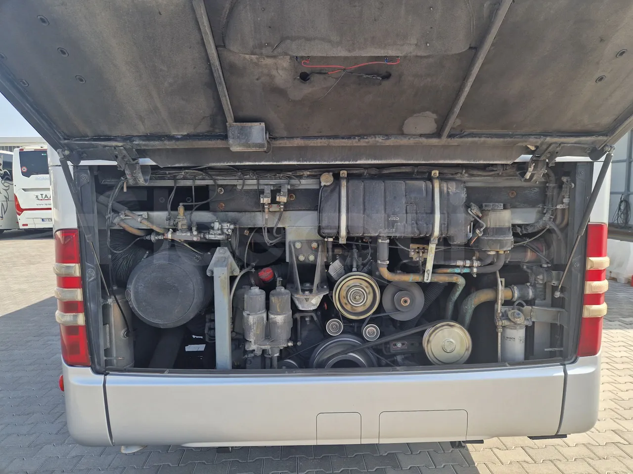 Mercedes-Benz Tourismo RHD/ Euro 5 - 300 Kw - 12,140 Mt - rear hatch open (mandatory for bus to scrap)