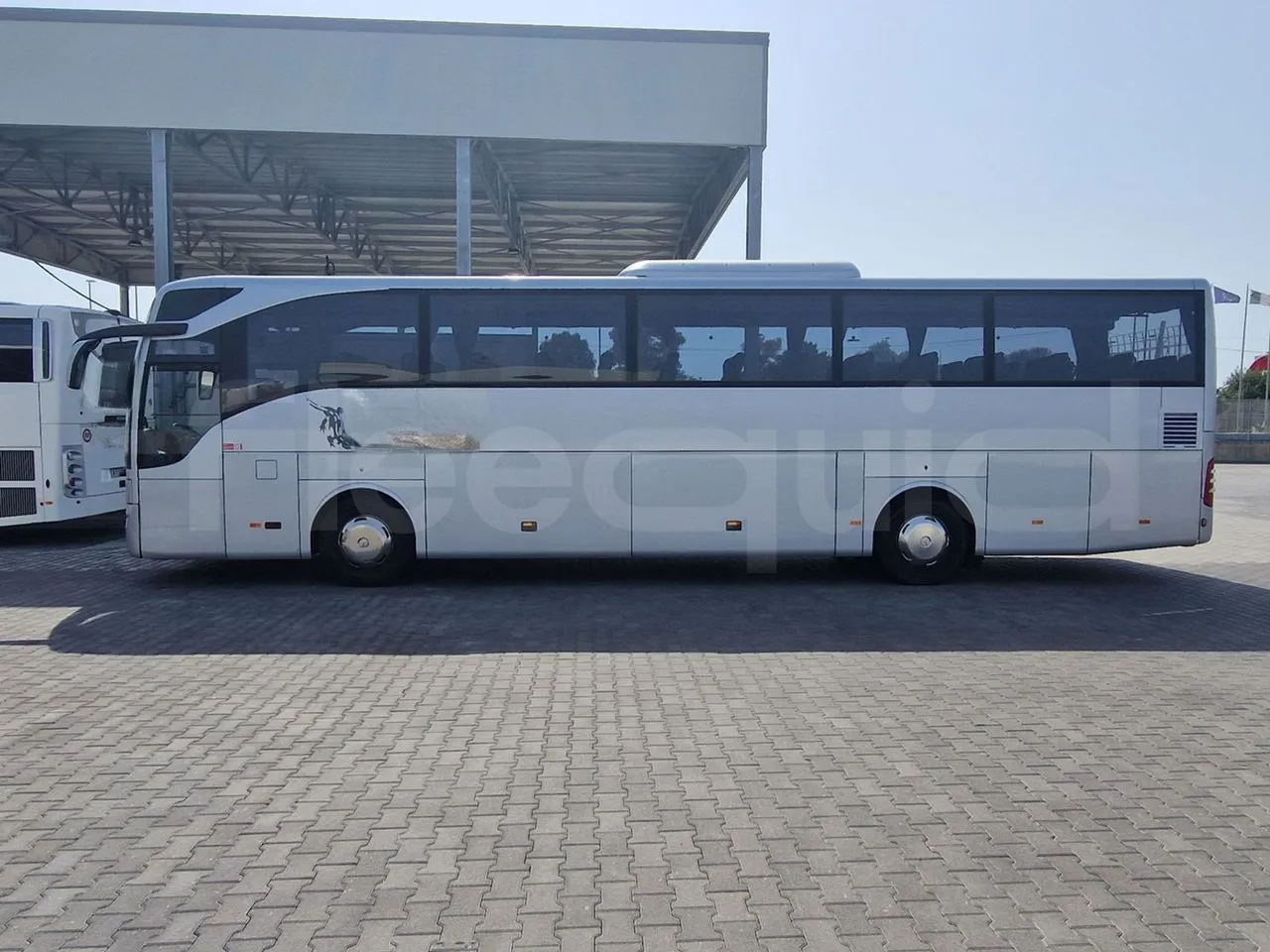 Mercedes-Benz Tourismo RHD/ Euro 5 - 300 Kw - 12,140 Mt - left side photo