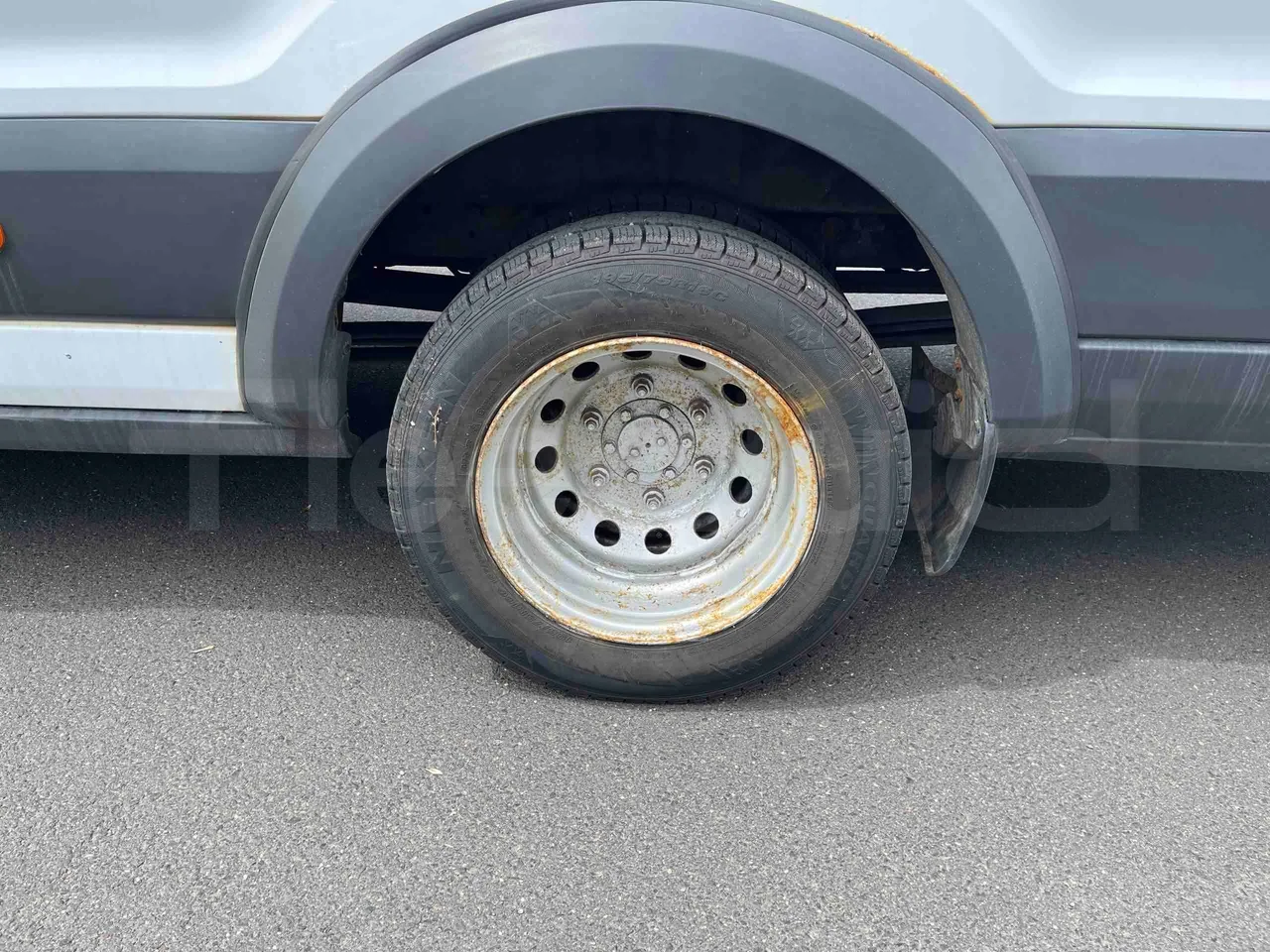 Ford Transit - rear left tire photo