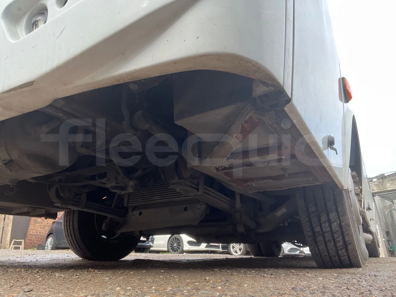 Isuzu Turquoise - front axle left side