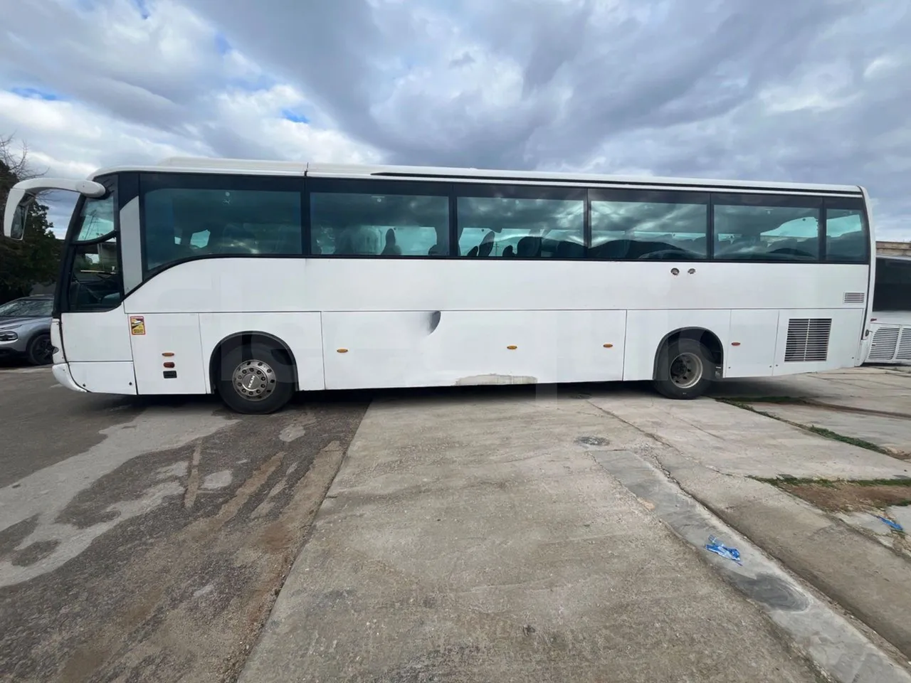 Man Noge Touring345 - EUR3 -  301kW - 13.000m - left side photo