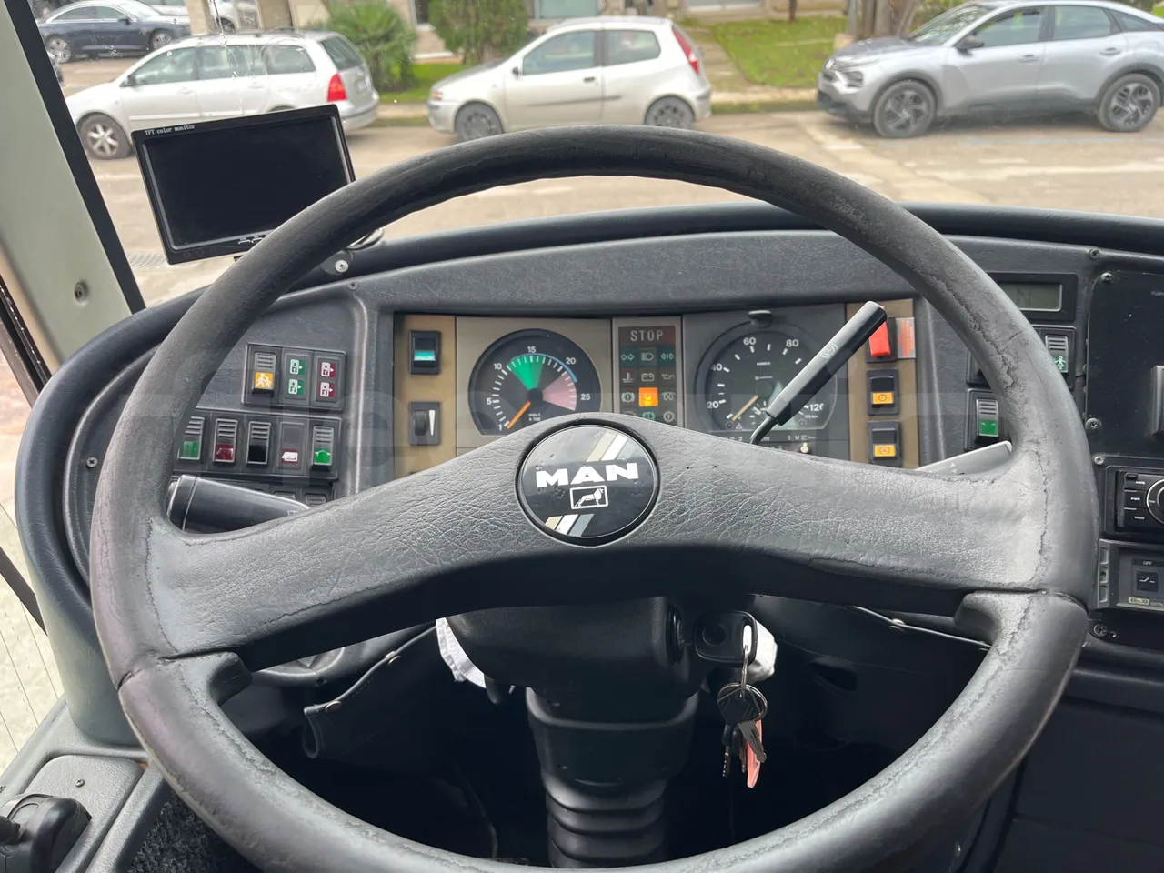 Man Noge Touring345 - EUR3 -  301kW - 13.000m - steering wheel photo