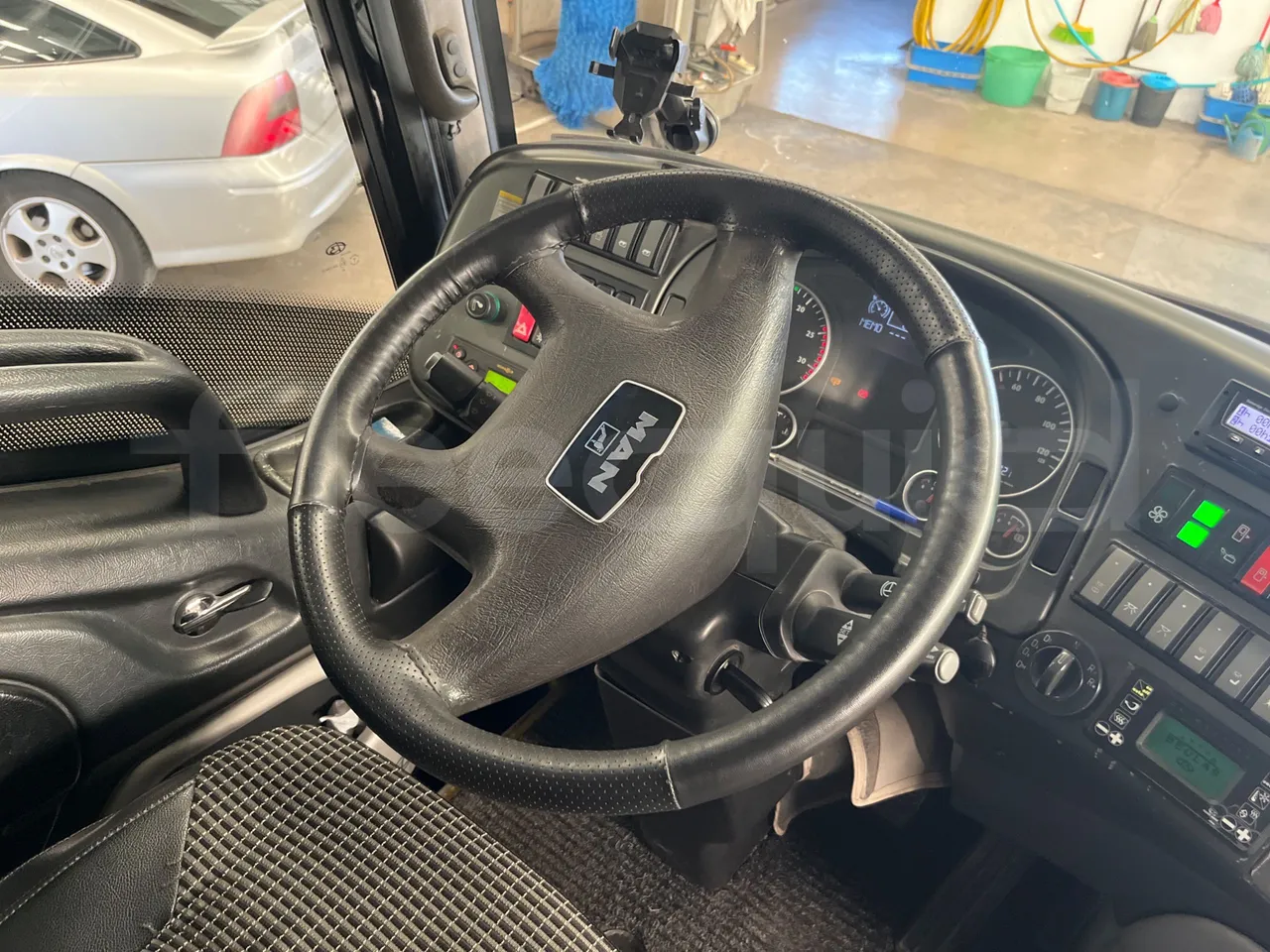 Man Ratio 18440-Ratio Stergo/ Euro 4 - 324 Kw - 12,720 Mt - steering wheel photo