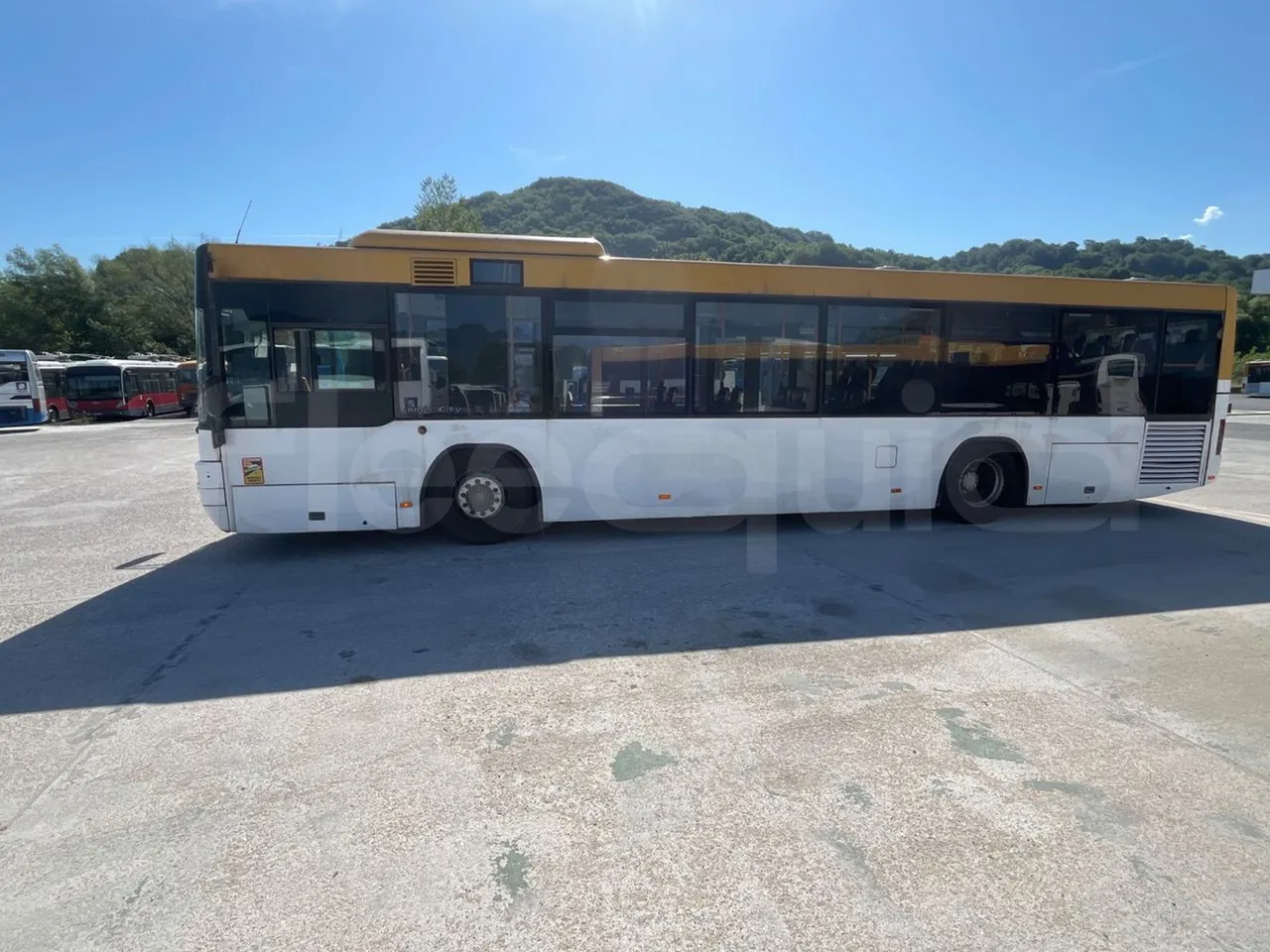 Man Lion's City T A78 - EUR4 - 191kW - 11.857m - left side photo