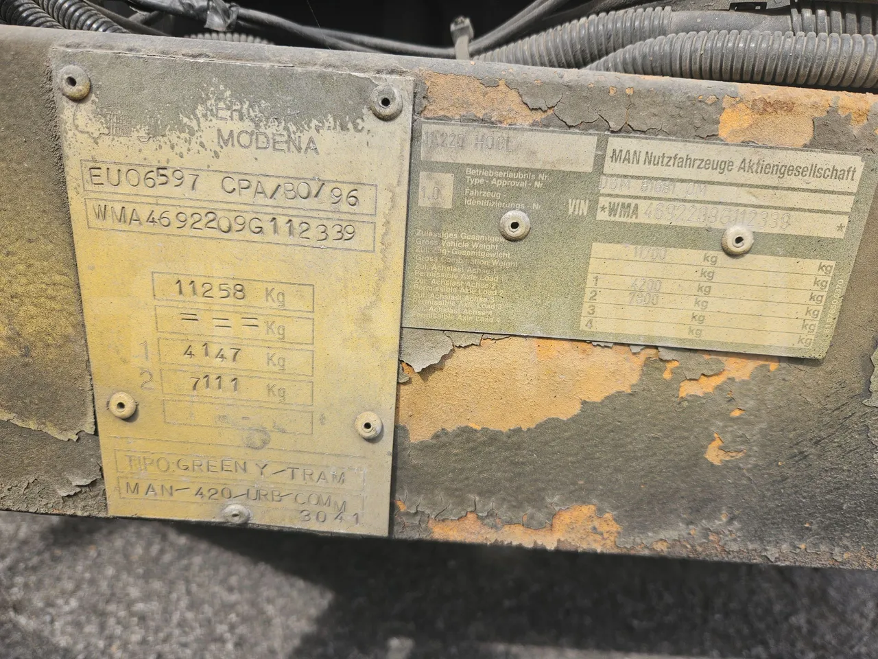 Man 11.220 Intercar Greeny / Euro2 - 162 Kw - 8,820 Mt - vehicle plate photo
