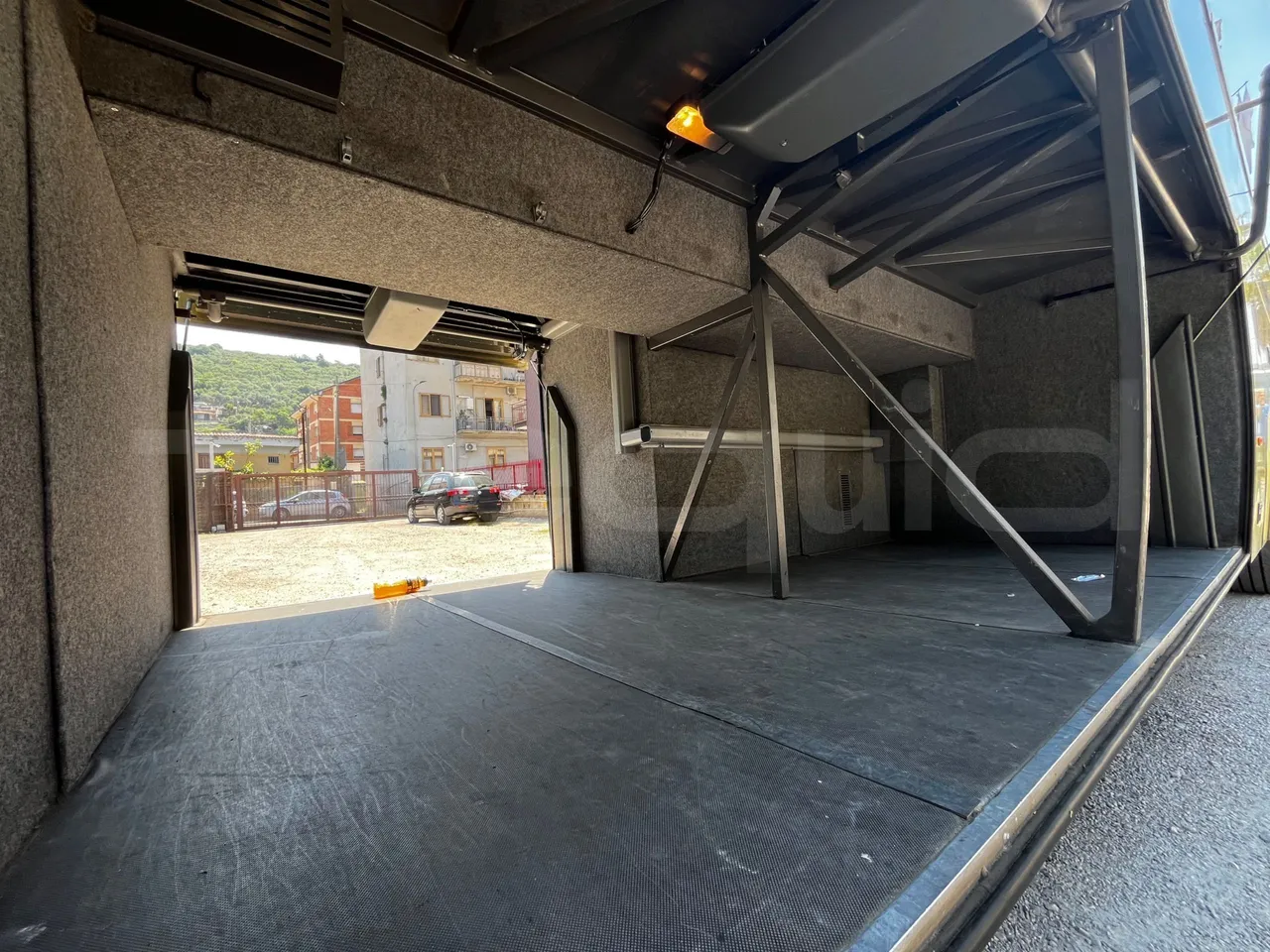 Irizar Century - Luggage Under Carpet Photo