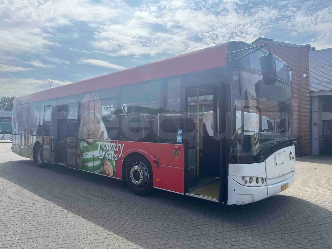 Solaris Urbino - 3/4 Front Right Side Doors Open