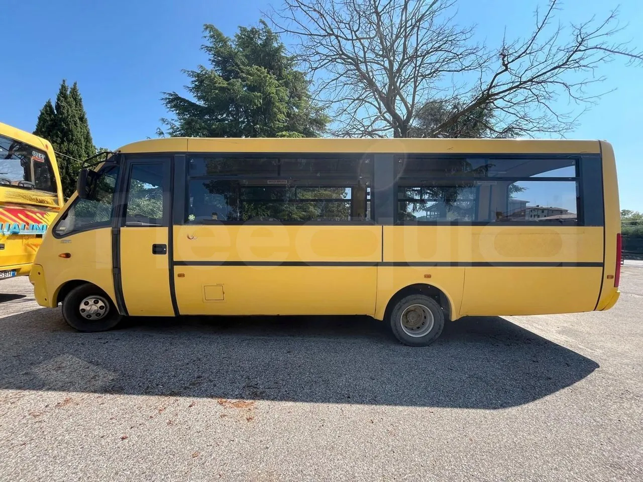 Iveco Cacciamali 65C/ Euro 3 - 122 Kw - 7,990 Mt - left side photo