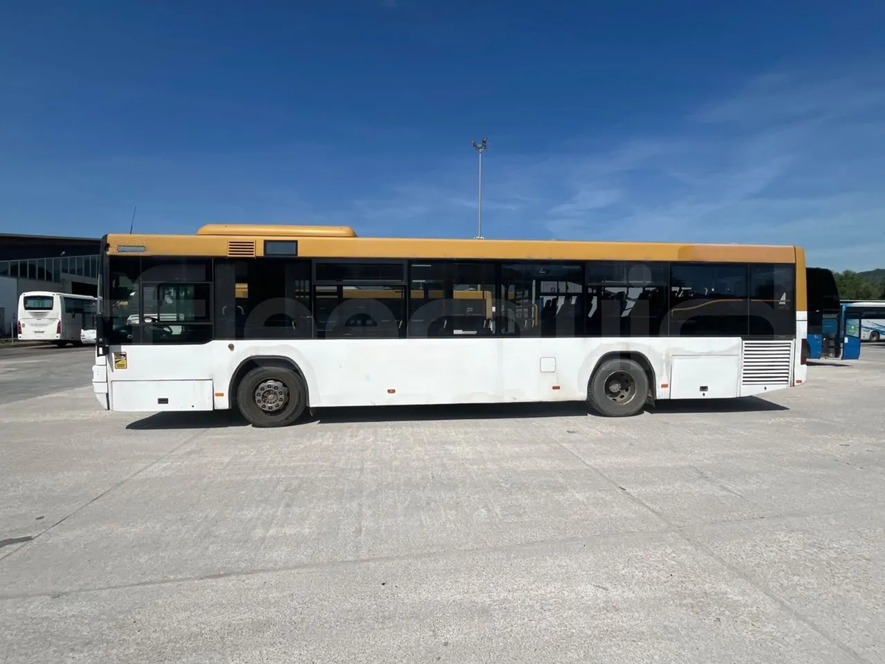 Man Lion's City T A78 - EUR4 - 191kW - 11.857m - left side photo