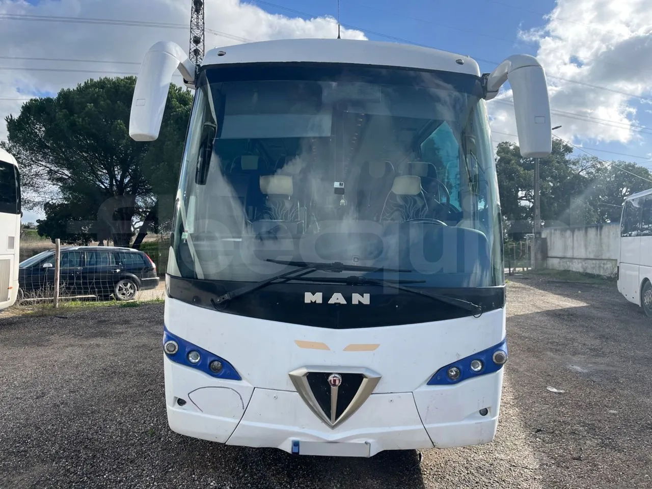 Man Noge TouringR33 - Euro4 - 324kW - 12.200mt - front photo